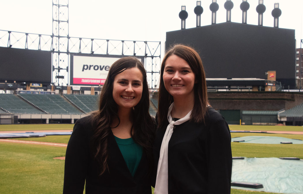 Two Cardinals working at the Chicago White Sox