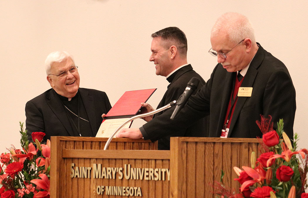 Bishop Quinn receives Presidential Award for Outstanding Merit